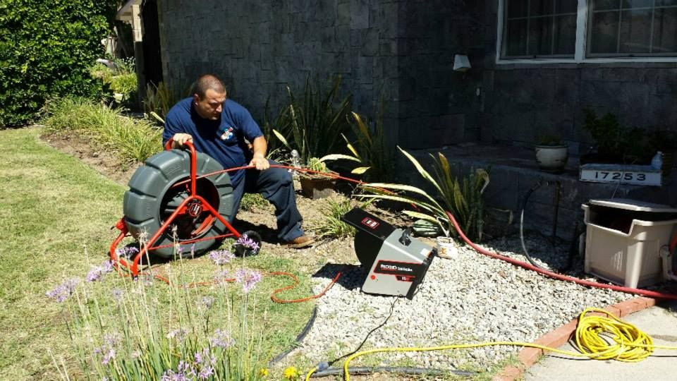 BBC Rooter technician performing sewer camera inspection